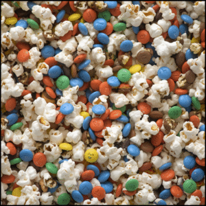 popcorn with chocolate chips and chocolate candies